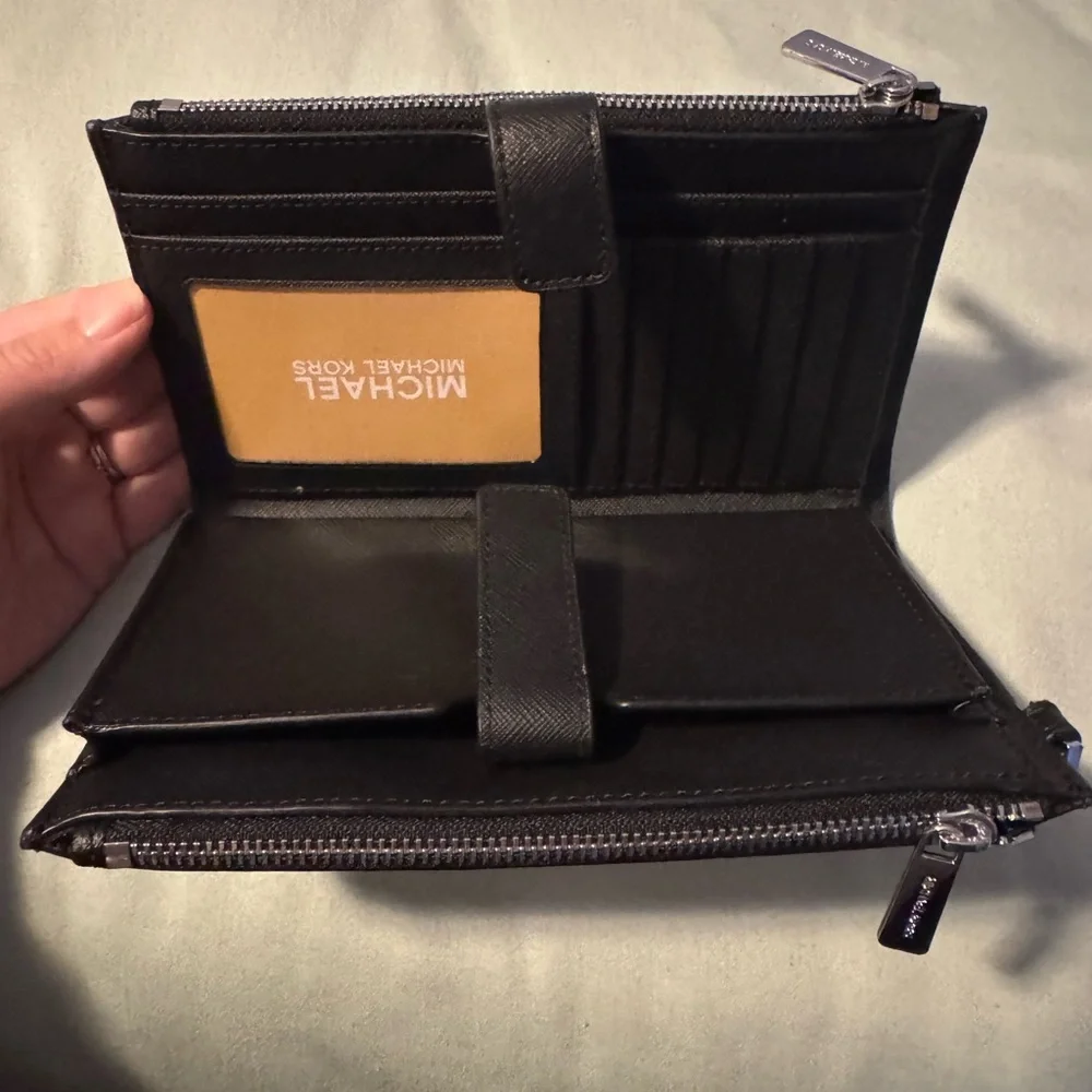 NWOT defect Michael Kors Black Wristlet